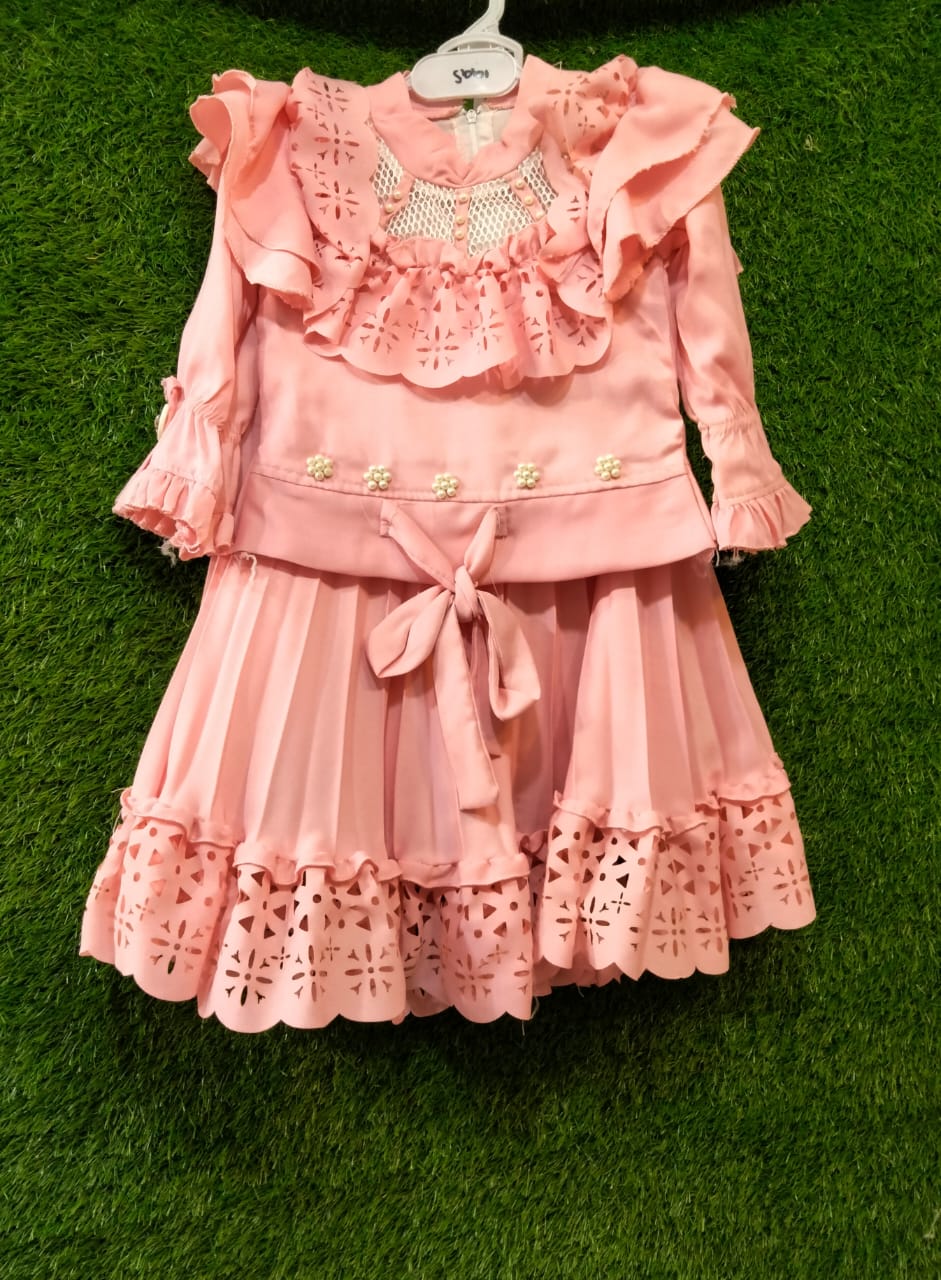 Girls Pink Party Frock with Ruffles, Floral Belt & Laser Cut Hem Elegant Designer Dress with Pleated Skirt & Net Yoke